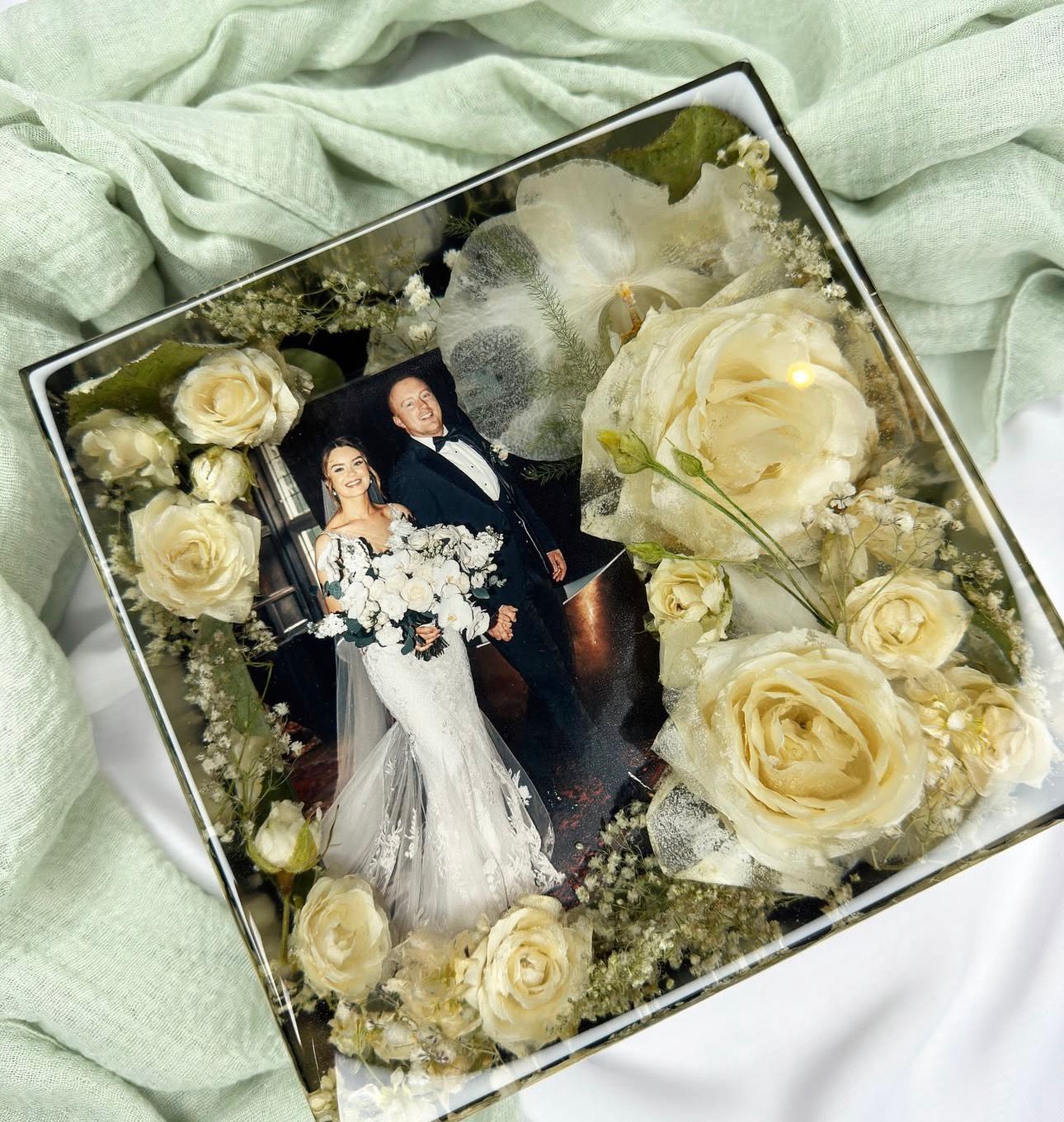 Ivory rose floral photo block with bride and groom portrait